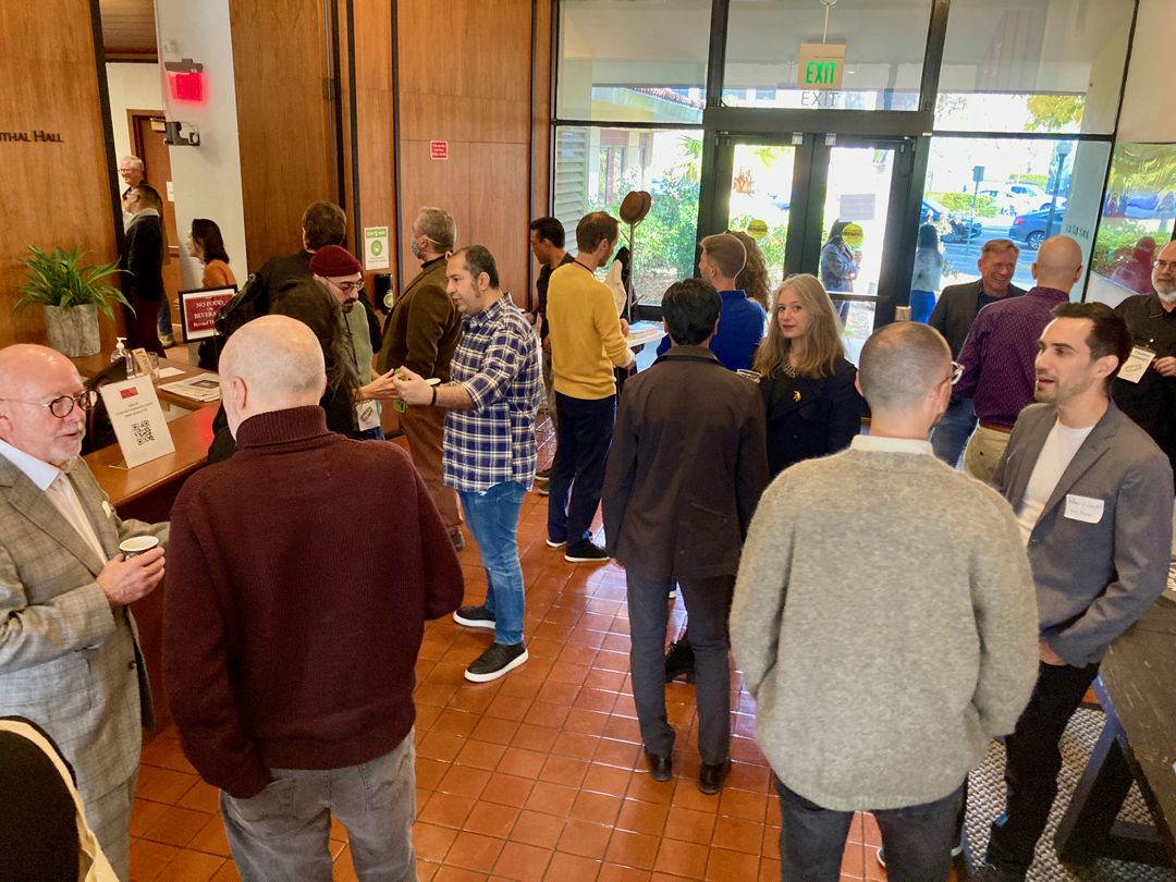 Attendees and presenters mingled before the Face/Interace program, at coffee breaks, and after. Photo by Delve Withrington.