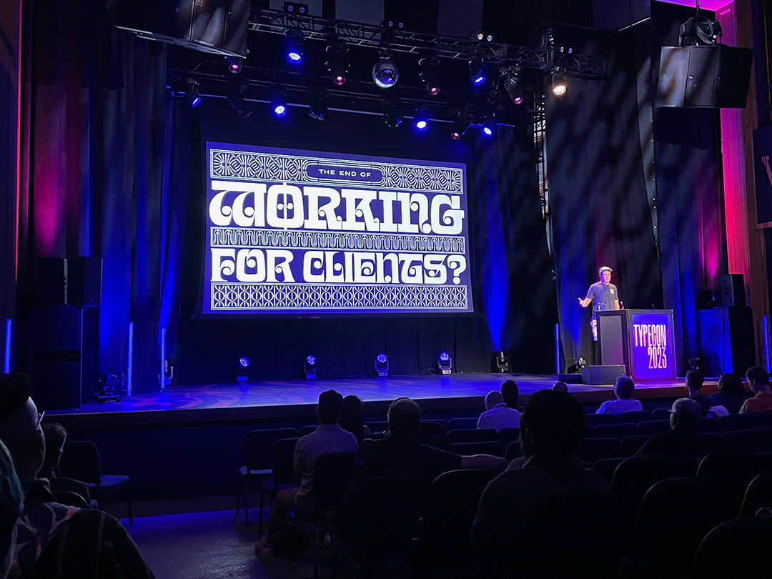 Keynote Presenter James Edmondson on stage at TypeCon 2023. Photo by John D. Berry
